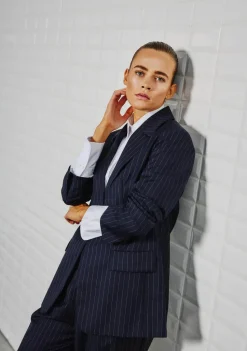 WITH BLACK BLAZER