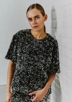 WITH BLACK BLOUSE